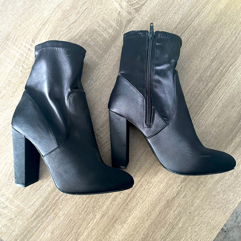 Black wedge heel boots